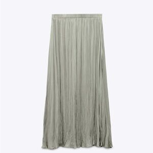 Pleated pull on elastic waist midi skirt by Zara.